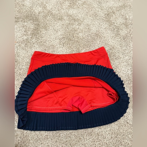 InPhorm NYC Kai Pleated tennis skort in poppy red and navy - Picture 5 of 11